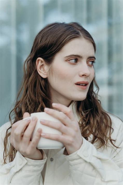 Woman Holding White Ceramic Mug · Free Stock Photo