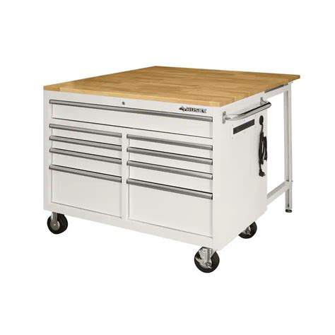 The Husky 46 in. 9-Drawer Mobile Workbench with fold up extended table provides a variety of ...