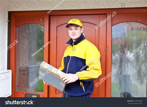 Young Postman In A Postman Uniform Stock Photo 125819888 : Shutterstock