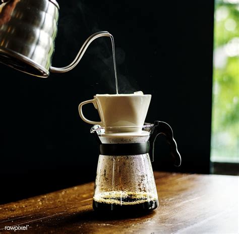 Download premium image of Barista hand dripping brewed coffee 94130 ...