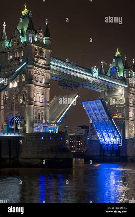 Tower Bridge opening at night, London, England, UK Stock Photo - Alamy