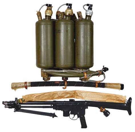 Sold Price: Military flamethrower, includes 3 gas tanks (2 tanks still intact - never o ...