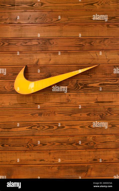 HONG KONG - APRIL 02: Nike, Inc. logo on wooden wall on April 02, 2014 ...