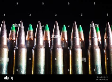 Cartridges loaded with armor piercing bullets some with green tips Stock Photo - Alamy