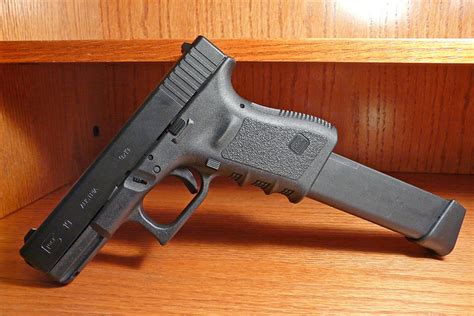 Glock 19 | Glock 19 9mm w/ 33 round mag. | By: Red Barnes | Flickr - Photo Sharing!