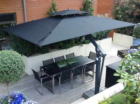 large parasol on stands garden - Google Search | Large patio umbrellas, Cantilever patio ...