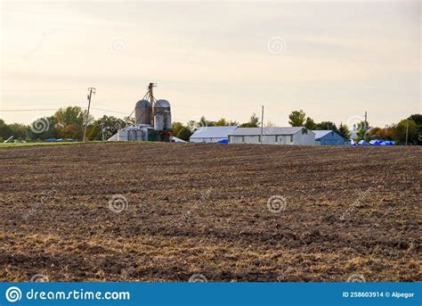 Farm at sunset in autumn stock photo. Image of colourful - 258603914