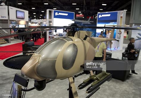 A Boeing "Unmanned Little Bird" helicopter is on display as people... News Photo - Getty Images