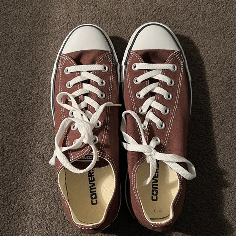 Brown canvas low top converse, worn three... - Depop