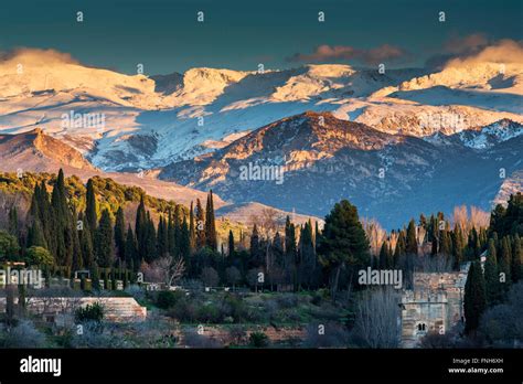 Winter view at sunset over Sierra Nevada, Granada, Andalusia, Spain Stock Photo - Alamy