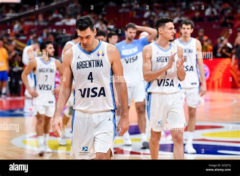 Luis Scola of Argentina, front, walks around after losing the Spain vs Argentina 2019 FIBA ...