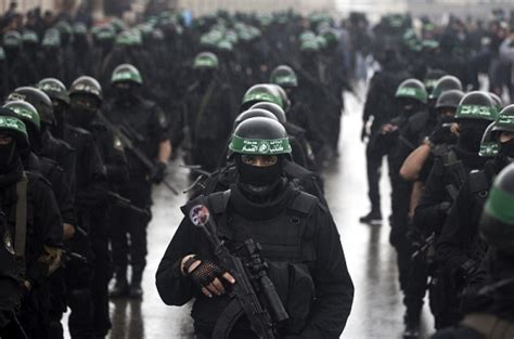 Hamas anniversary parade: 2000 militants march across Gaza vowing to ...