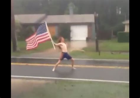 VIDEO: Florida Man waves American Flag during Hurricane Matthew