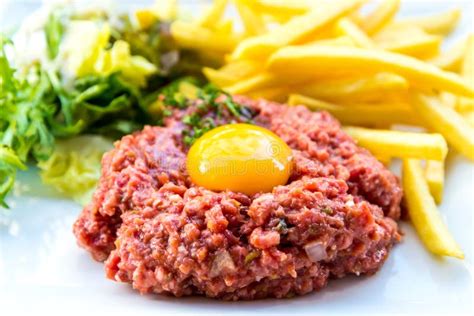 Tasty Steak Tartare (Raw Beef) Stock Photo - Image of recipe, onion ...