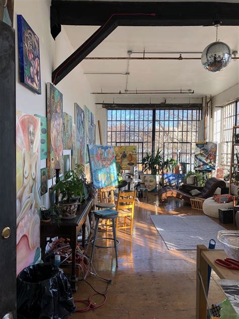 Beautiful large sunny artist's loft with 2 walls of industrial windows ...