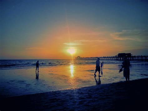 Naples beach at sunset Photograph by Susan Jacob | Fine Art America