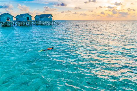 Premium Photo | Snorkeling in tropical maldives island