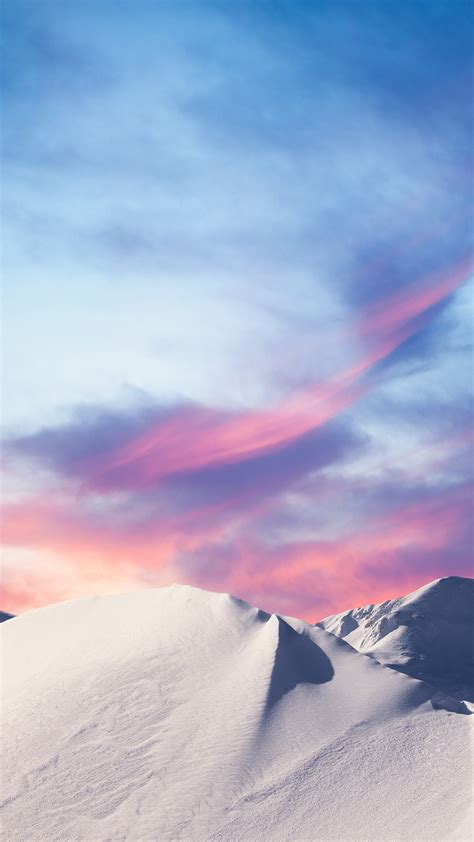 Snowcapped mountains at winter sunset, Slovenia | Windows Spotlight Images