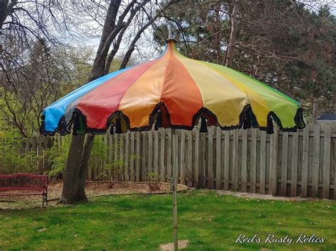 Groovy Umbrella Circus Top Rainbow Patio Umbrella with Black | Reds ...