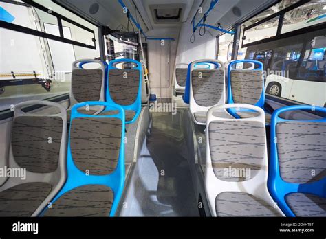 Interior of modern bus with passenger seats Stock Photo - Alamy