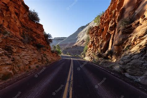 Premium Photo | Scenic road in american mountain landscape sunny morning sunrise sky