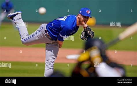 Toronto Blue Jays pitcher Hobie Harris delivers during a spring ...