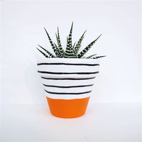 Hand Painted Plant Pot - Orange Stripe via This Way To The Circus. Click on the image to see ...
