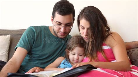 Family Reading the Bible Together Stock Video - Video of family, religious: 76031457