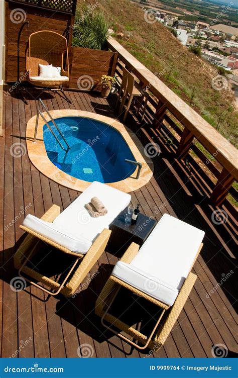 Pool Deck with Lounge Chairs Stock Photo - Image of resort, serenity: 9999764