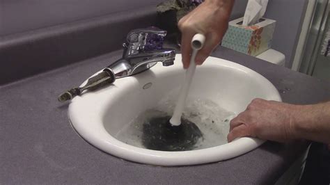 Plunge a Clogged Bathroom Sink - YouTube