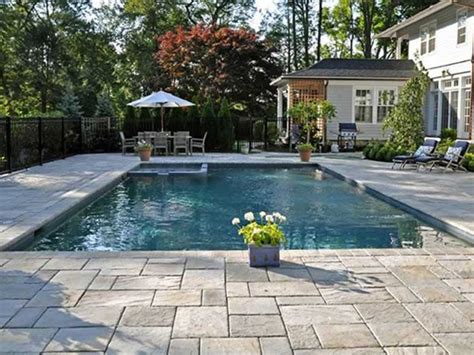 Pool Decks: Pavers Vs. Stamped Concrete - Which is Best for Homeowners?