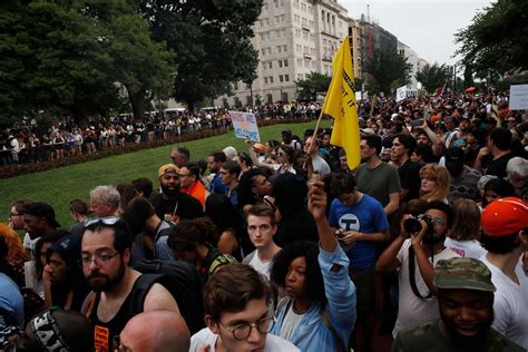 Thousands gather to protest heavily outnumbered 'Unite the Right' rally ...