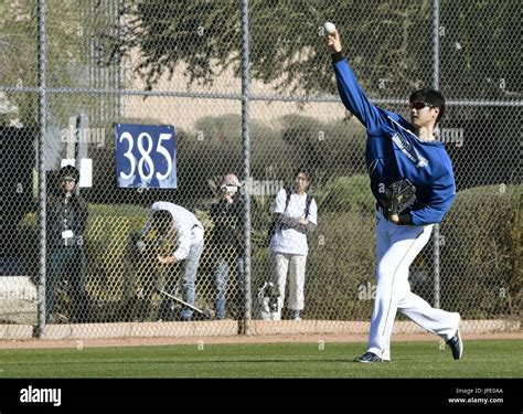 Injury-hit Nippon Ham Fighters two-way player Shohei Otani plays catch ...