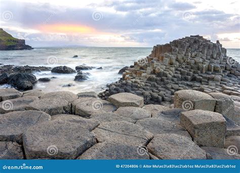 Sunset at Giant s causeway stock photo. Image of northern - 47204806