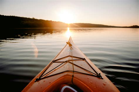 Kayak on river in sunset time · Free Stock Photo