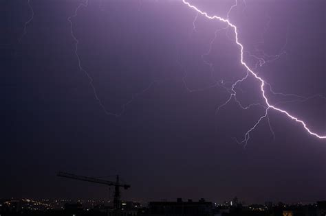 Premium Photo | Lightning and thunderstorm on night sky.