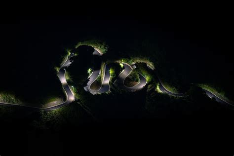 Premium Photo | Elevated view of beautiful s curved road at night, keelung mountain of taiwan ...