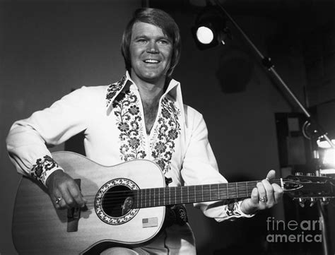 Singer Glen Campbell Playing Guitar Photograph by Bettmann - Fine Art ...