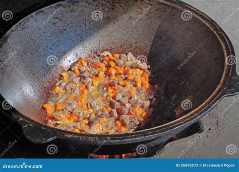 Cooking in a cauldron stock photo. Image of tourism, pepper - 26895572