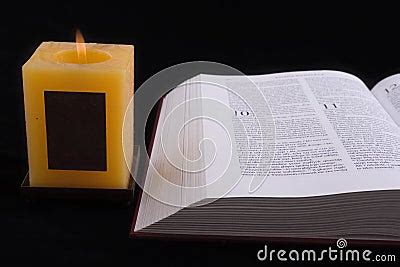 Open Bible And Candle Stock Photo - Image: 3882400