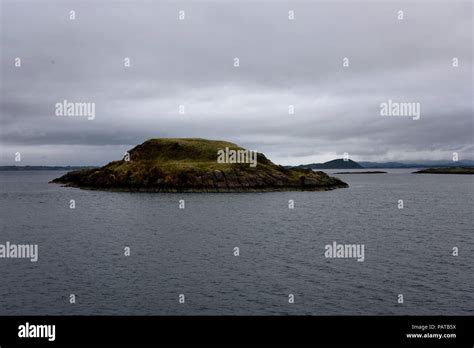 Views of Oban castle and it's many small islands Stock Photo - Alamy