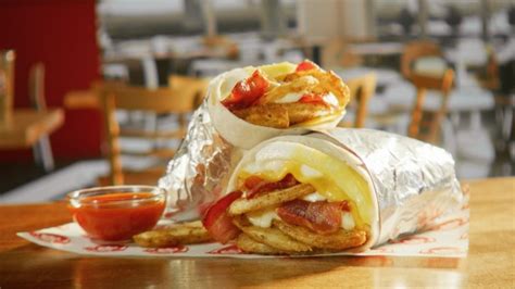 Wendy's New Breakfast Burrito Doesn't Shy Away From The Bacon