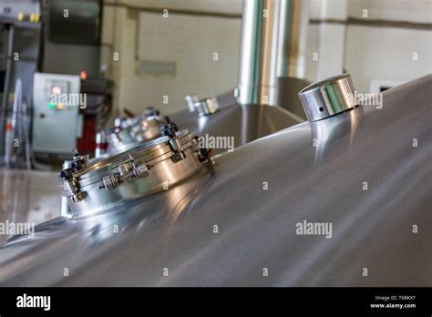 Equipment for production of beer in factory shops Stock Photo - Alamy