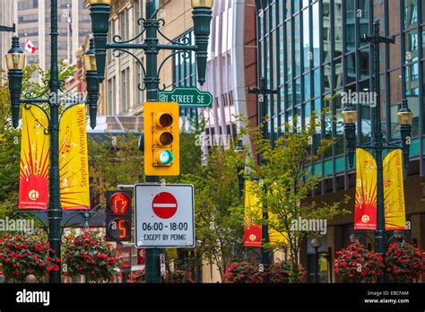 Skyscrapers and green traffic light in Calgary Alberta Canada Stock Photo - Alamy