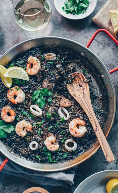 Arròs Negre (Squid Ink Paella/Paella Negra) - Lemons + Anchovies | Recipe | Recipes, Paella ...