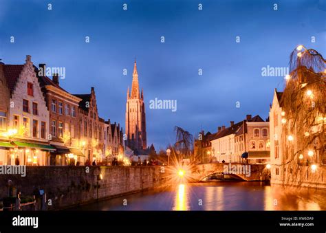 Bruges cityscapes during christmas with lights and blue skies, Belgium ...