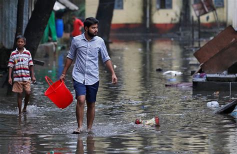 Dozens Trapped After Mumbai Building Collapses After Deadly Floods ...