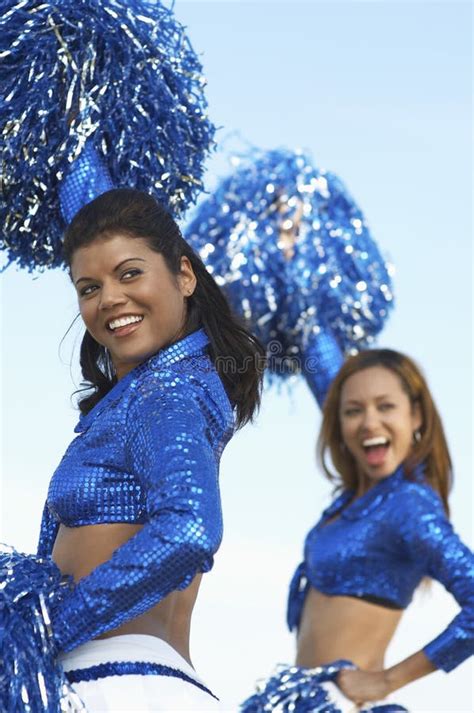 Cheerleaders Cheering in Blue Uniform Stock Image - Image of female ...