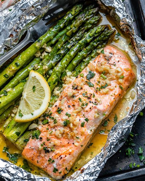 Baked Salmon in Foil with Asparagus and Garlic Butter Sauce – Baked Salmon Recipe — Eatwell101