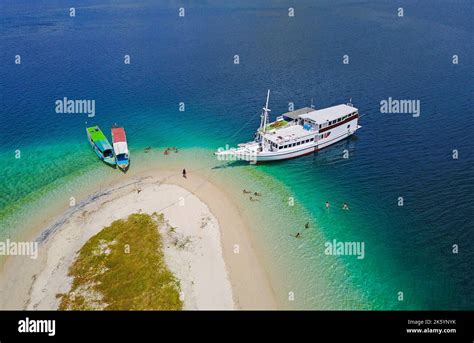 Beautiful aerial view of beaches and tourist boat sailing in Flores ...